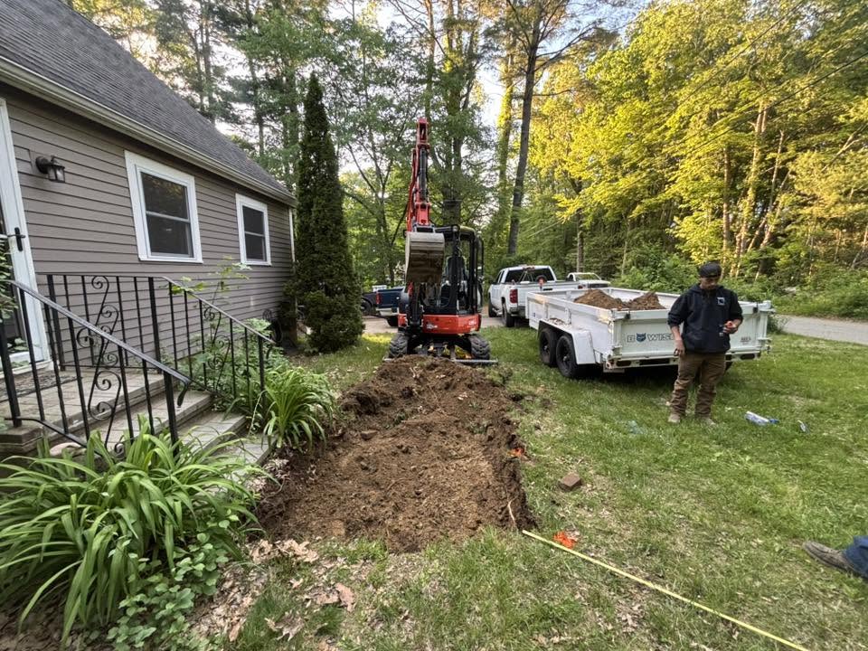 Unexcavated ground where new paver walkway will be installed